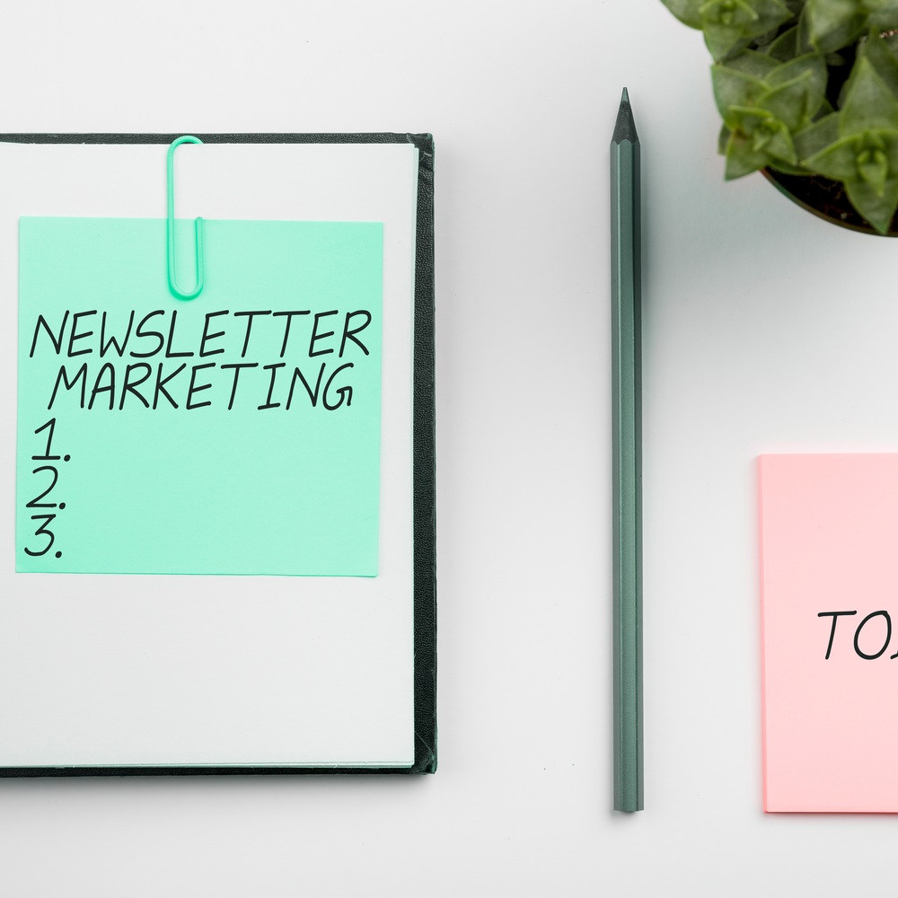 Hand writing sign Newsletter Marketing, Conceptual photo act of sending a commercial messages to customer