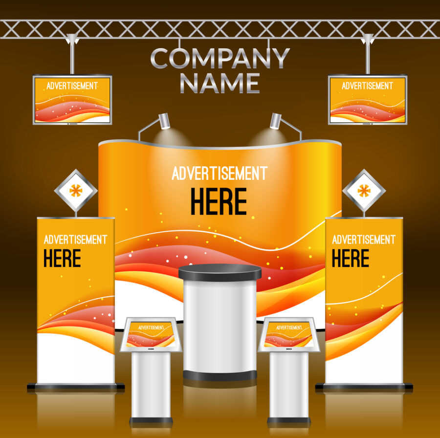 representation of marketing display items to brand for a trade show. Orange and white banners on a brown background.