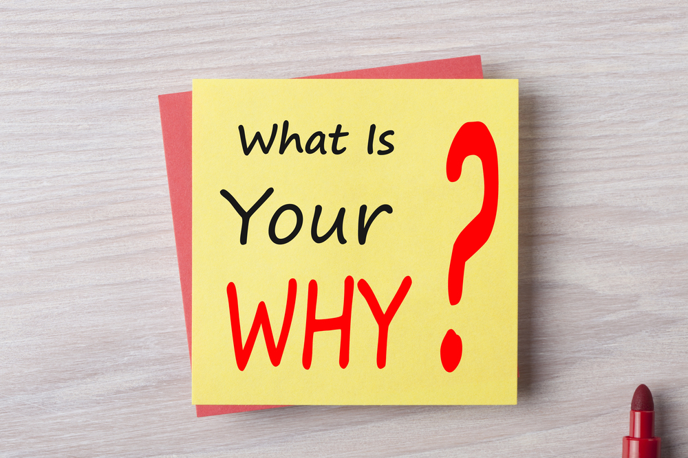 yellow post it note on top of red post it note with text what is your why